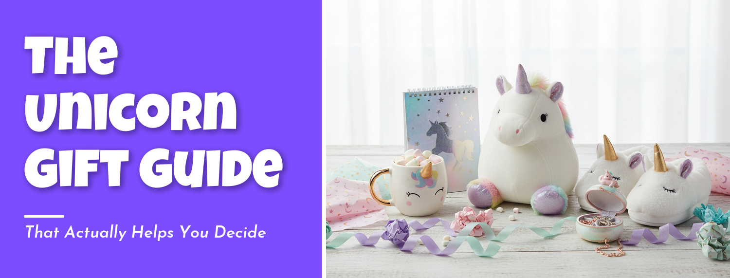 Assortment of unicorn gifts laid out with wrapping paper