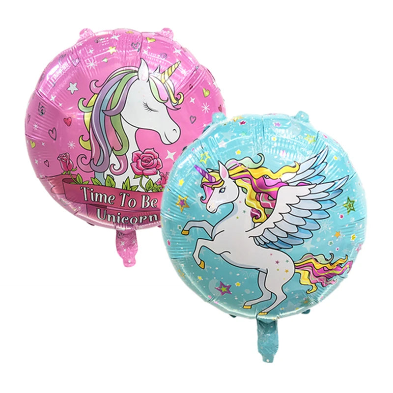 Round foil balloon showing the closed-eye unicorn face up close