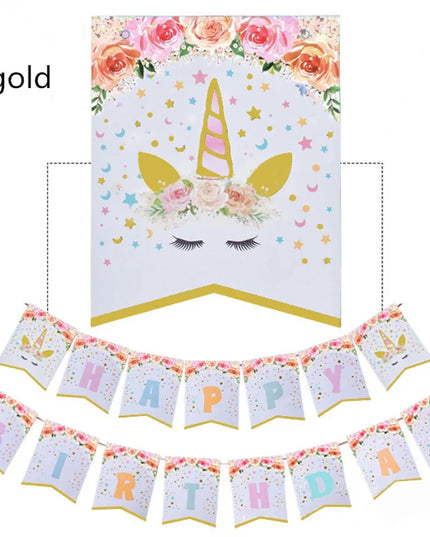 Unicorn banner hung on a wall above a birthday table