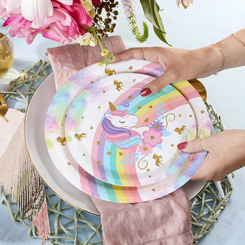 Close-up of the gold unicorn and star print on the white tablecloth