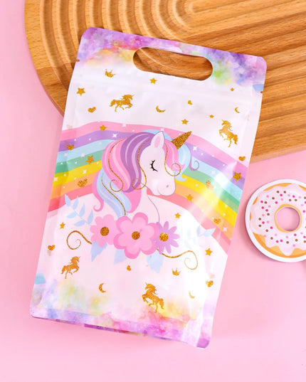 Bag filled with candy and small party favors on a table