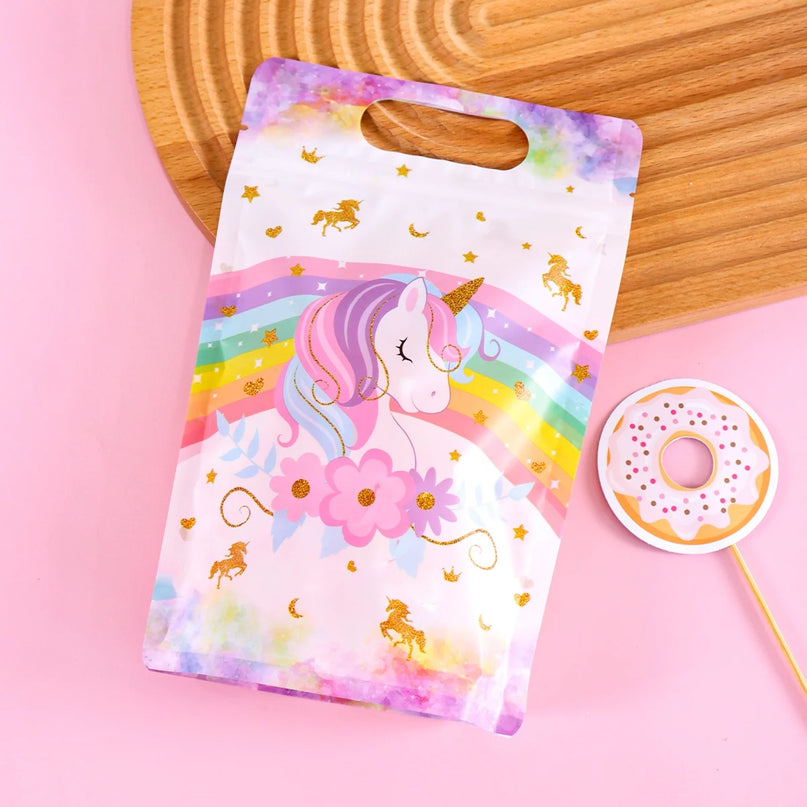 Bag filled with candy and small party favors on a table