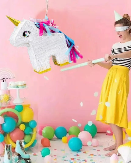 Pink and blue mane detail on the white unicorn pinata