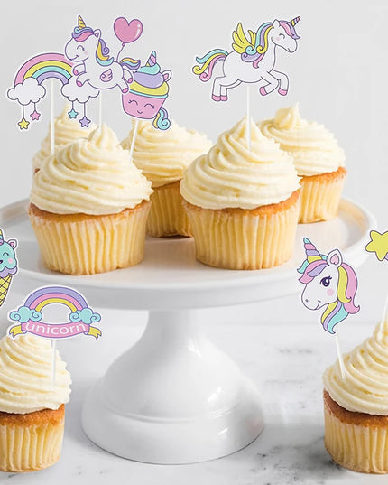 Rainbow unicorn paper plates next to matching party decorations