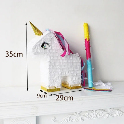 White unicorn pinata with gold horn and pink and blue mane