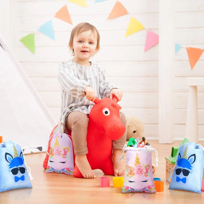 Several pink unicorn bags side by side for the birthday party