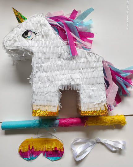 White Unicorn pinata set with pink, turquoise and purple fringe mane and golden horn