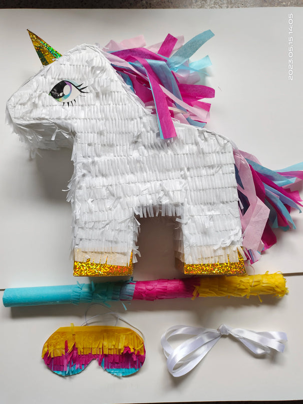 White Unicorn pinata set with pink, turquoise and purple fringe mane and golden horn