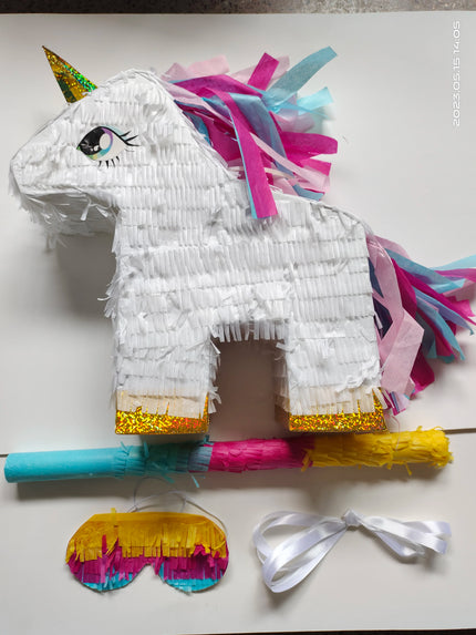 White Unicorn pinata set with pink, turquoise and purple fringe mane and golden horn
