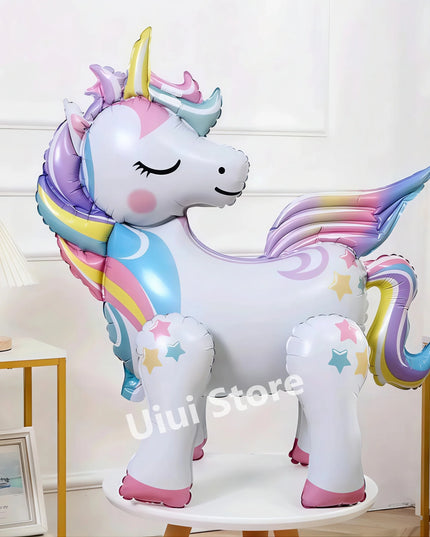 Close-up of the rainbow and unicorn print on the party tableware