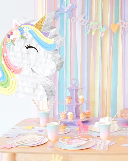 Pastel striped blindfold and wooden stick included with the pinata
