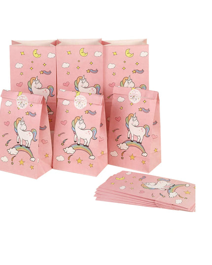 Twelve party favor bags with unicorn print lined up side by side
