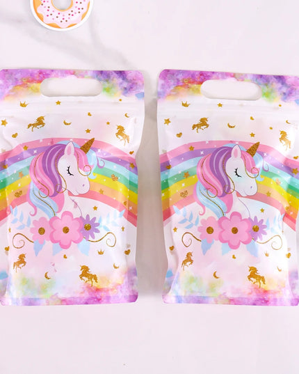Small gold unicorns and stars printed on the white plastic bag