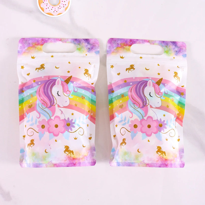 Small gold unicorns and stars printed on the white plastic bag