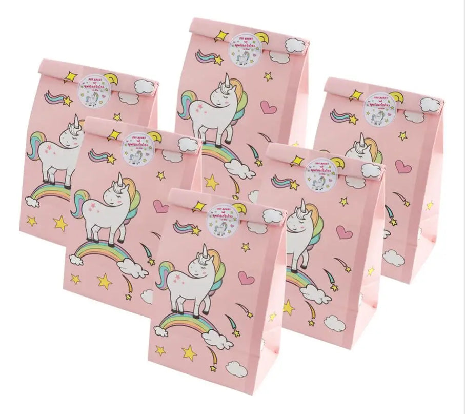 Pink bags with printed unicorns and stars in a set