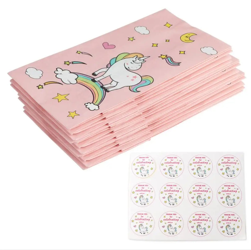 Several pink bags with rainbows and hearts for the birthday party