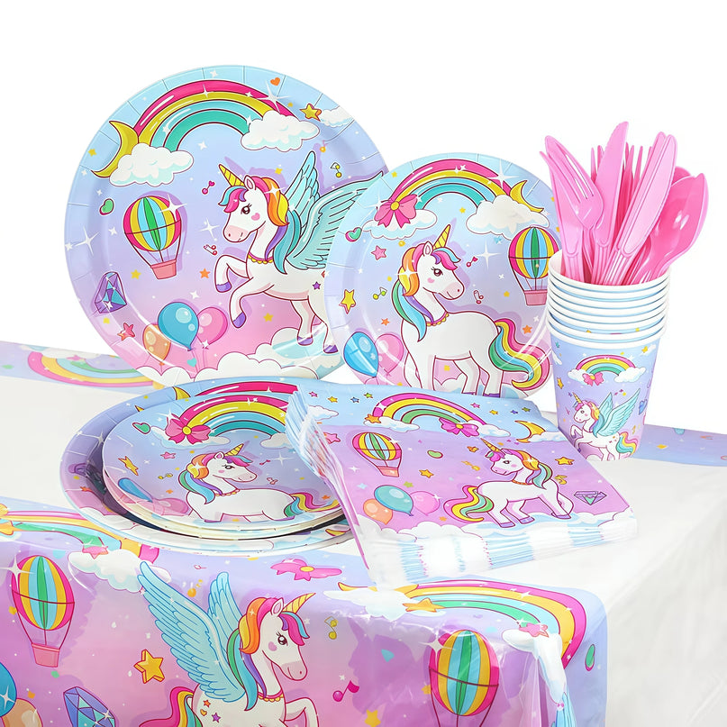 Complete unicorn tableware set laid out for a birthday party