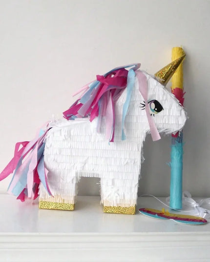 Side angle of the unicorn pinata showing its full shape