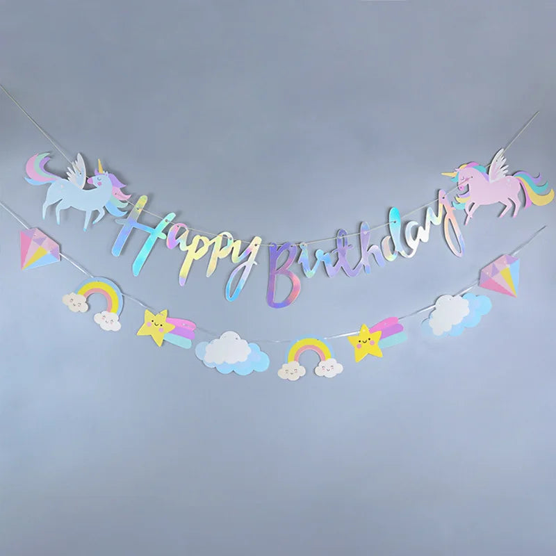 Stack of small and large unicorn party plates with matching cups