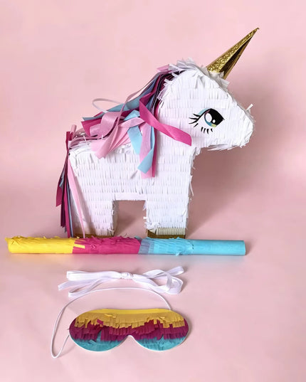 Unicorn pinata filled with candy for a birthday party game