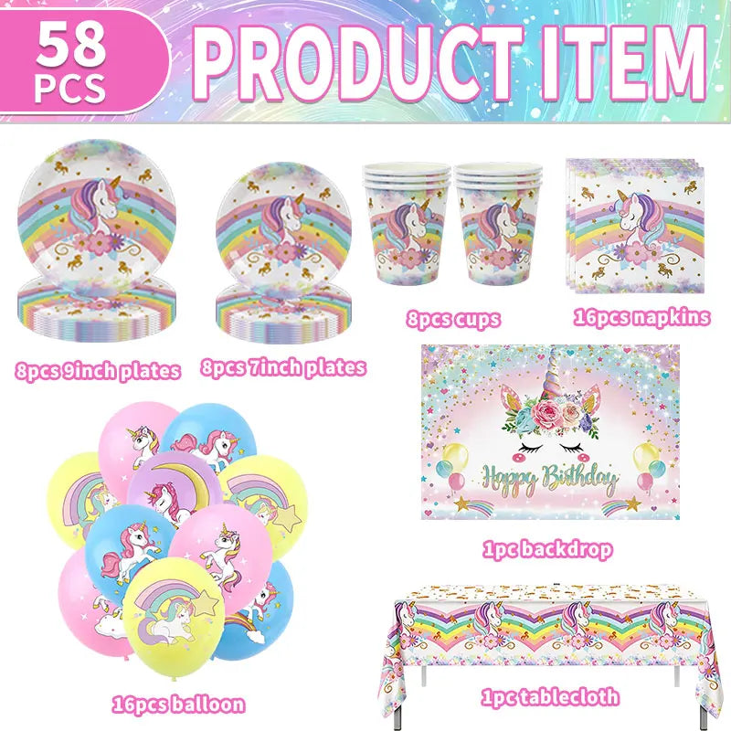 Pastel unicorn tablecloth spread out for a birthday table