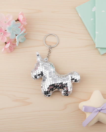 acrylic unicorn keychain - flat-lay