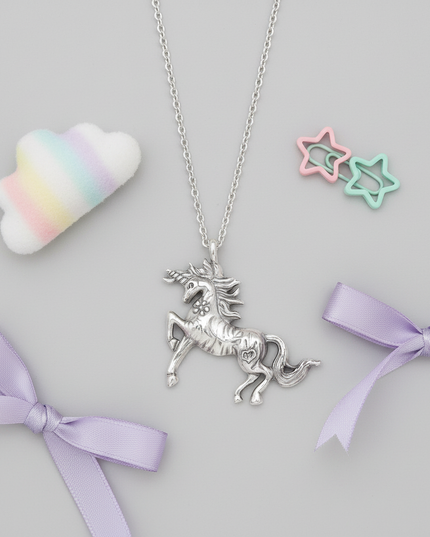 antique unicorn necklace - flat-lay