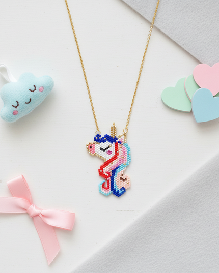 beaded unicorn necklace - flat-lay