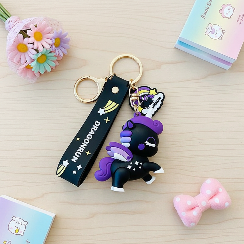 black unicorn keychain - flat-lay