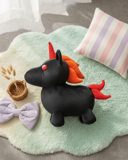 black unicorn plush - flat-lay