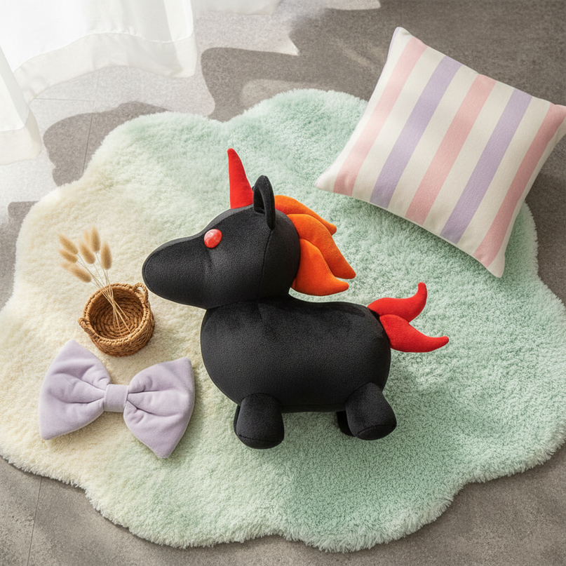 black unicorn plush - flat-lay