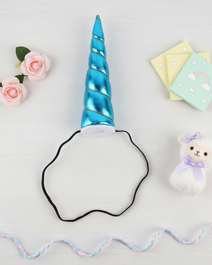 blue elastic unicorn horn - flat-lay