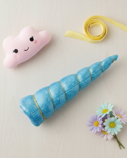 blue felt unicorn horn set - flat-lay