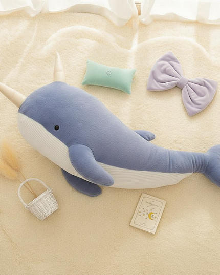 blue narwhal plush - flat-lay