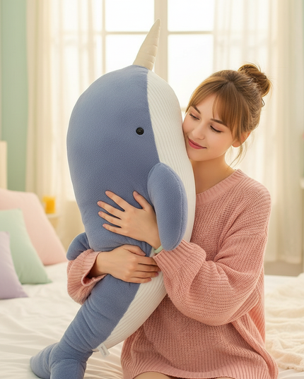 blue narwhal plush - in-use