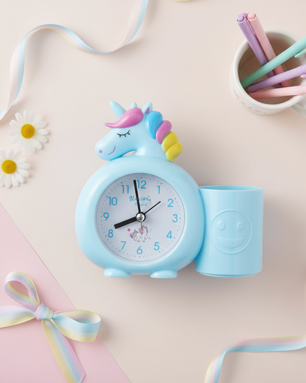 blue unicorn alarm clock - flat-lay
