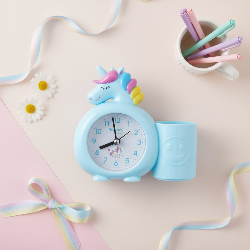 blue unicorn alarm clock - flat-lay