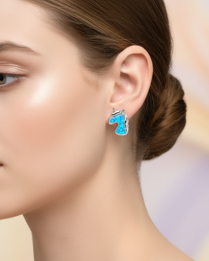 blue unicorn earrings - in-use