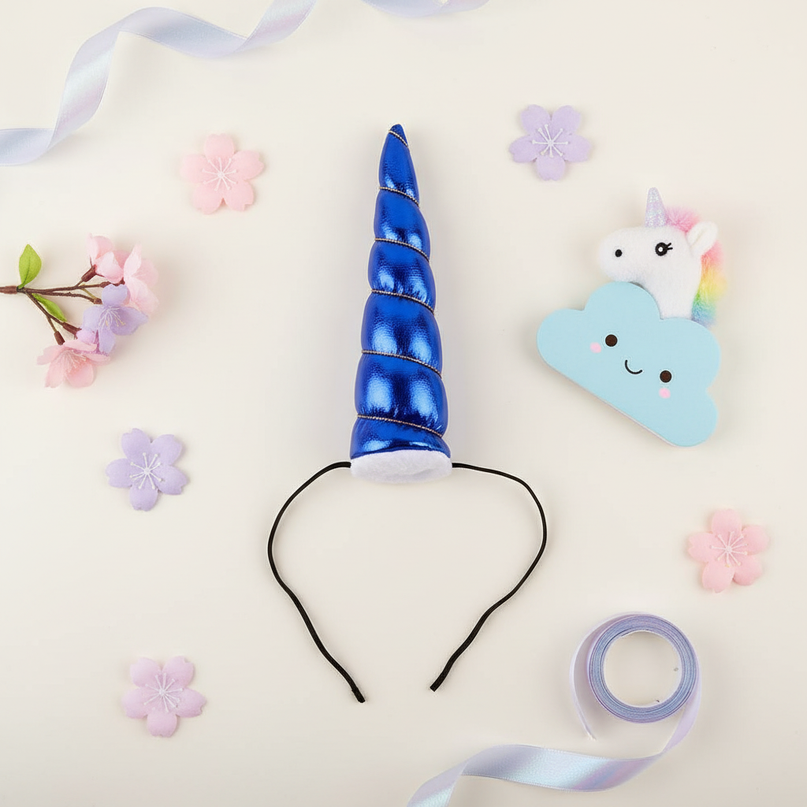 blue unicorn horn birthday - flat-lay