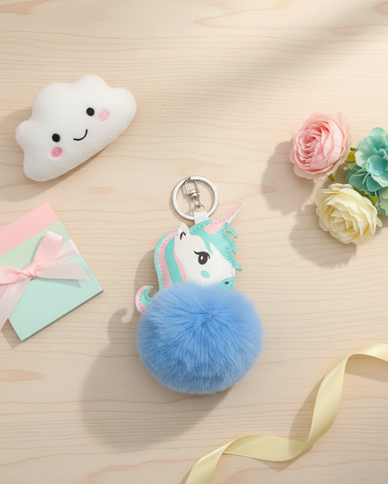 blue unicorn keychain - flat-lay
