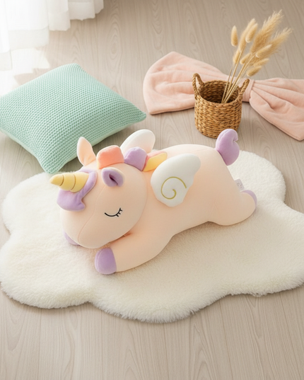 blue unicorn lying plush - flat-lay