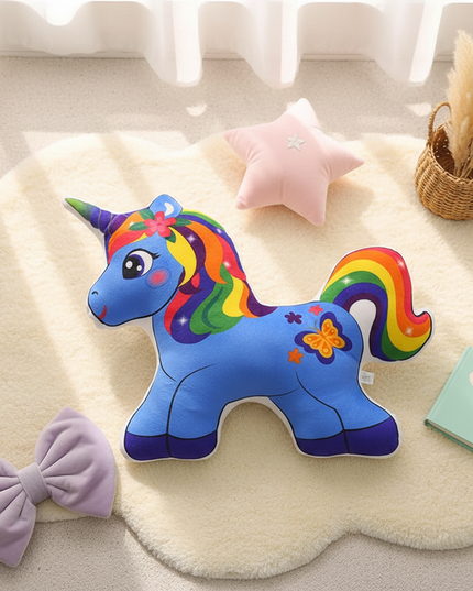 blue unicorn plush pillow - flat-lay