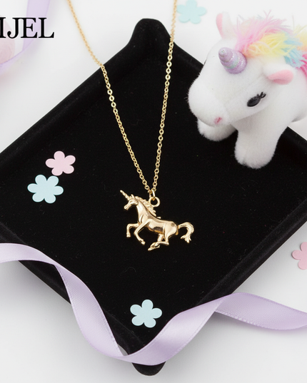 charging unicorn necklace - flat-lay