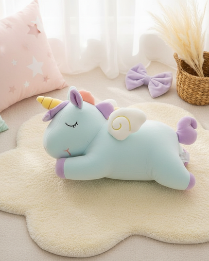 cuddly pink unicorn plush - flat-lay