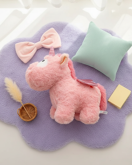 cute pink winged unicorn plush toy - flat-lay