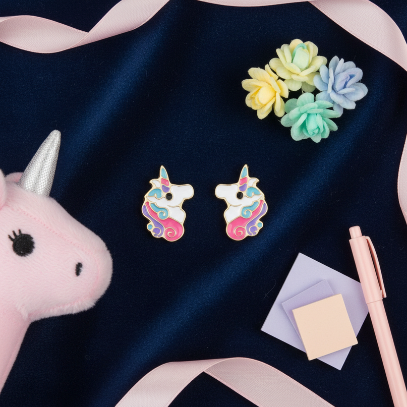 cute unicorn earrings - flat-lay