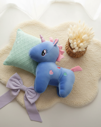cute unicorn plush - flat-lay