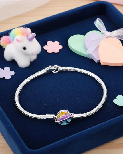enamel unicorn bracelet - flat-lay
