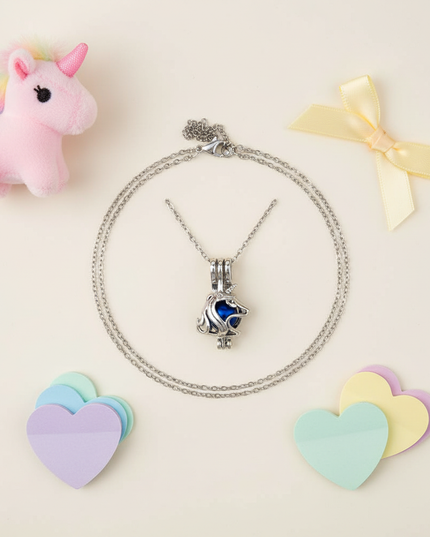 geometric unicorn head necklace - flat-lay