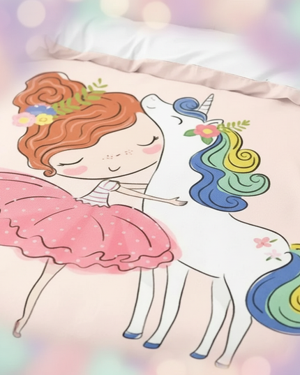 girl hugging unicorn bedding - detail